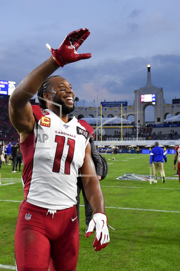 Mark J. Terrill Arizona Cardinals wide receiver Larry Fitzgerald leaves the field after their loss against the Los Angeles Rams in an NFL football game Sunday, Dec. 29, 2019, in Los Angeles. (AP Photo/Mark J. Terrill)