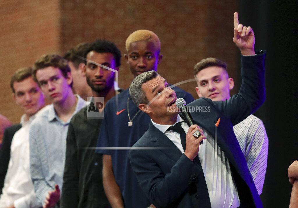 Virginia coach Tony Bennett speaks at the start of a celebration of Virginia's NCAA men's basketball title, Friday, Sept. 13, 2019, in Charlottesville, Va. A banner was raised at John Paul Jones Arena. (Andrew Shurtleff/The Daily Progress via AP)