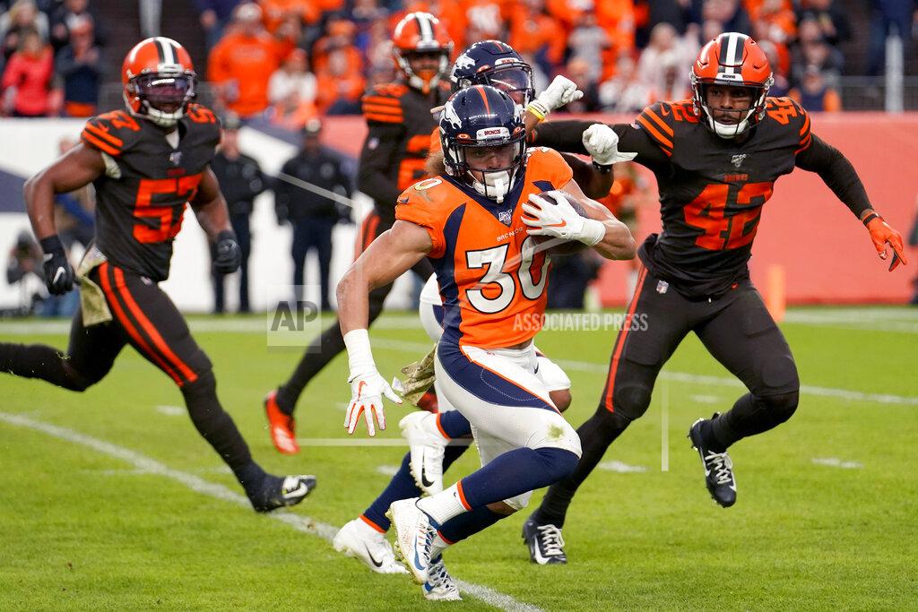 Jack Dempsey Denver Broncos running back Phillip Lindsay (30) runs for a 30-yard touchdown against the Cleveland Browns during the second half of NFL football game, Sunday, Nov. 3, 2019, in Denver. (AP Photo/Jack Dempsey)