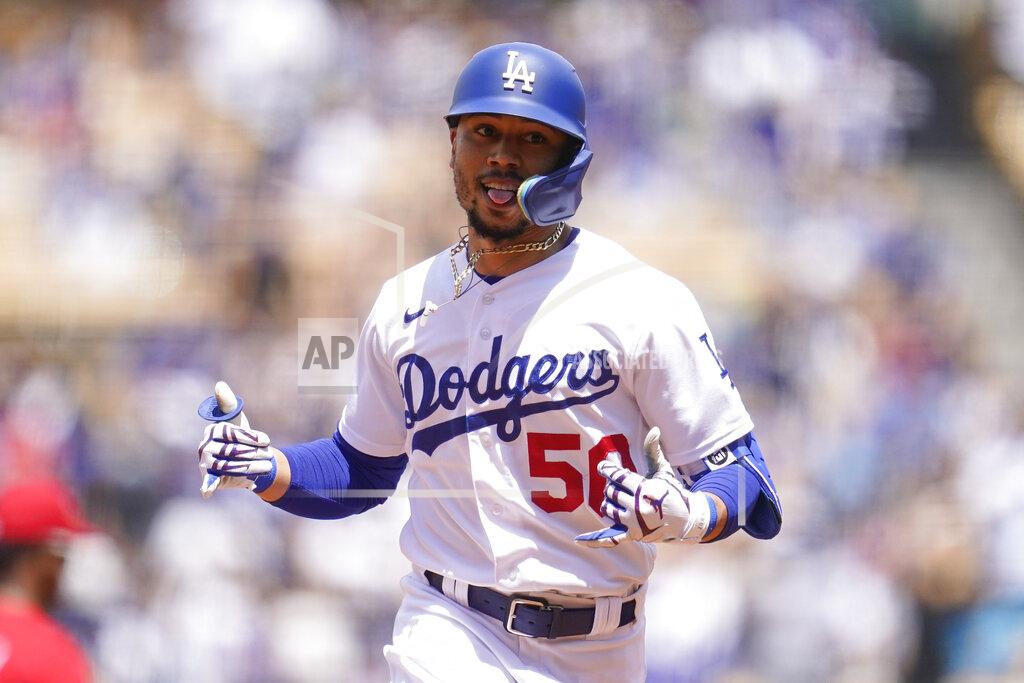 Ashley Landis Los Angeles Dodgers' Mookie Betts (50) runs the bases after hitting a home run during the third inning of a baseball game against the Philadelphia Phillies in Los Angeles, Sunday, May 15, 2022. (AP Photo/Ashley Landis)