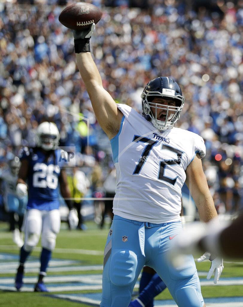James Kenney Tennessee Titans' David Quessenberry (72) celebrates after catching a touchdown pass against the Indianapolis Colts in the first half of an NFL football game Sunday, Sept. 15, 2019, in Nashville, Tenn. (AP Photo/James Kenney)