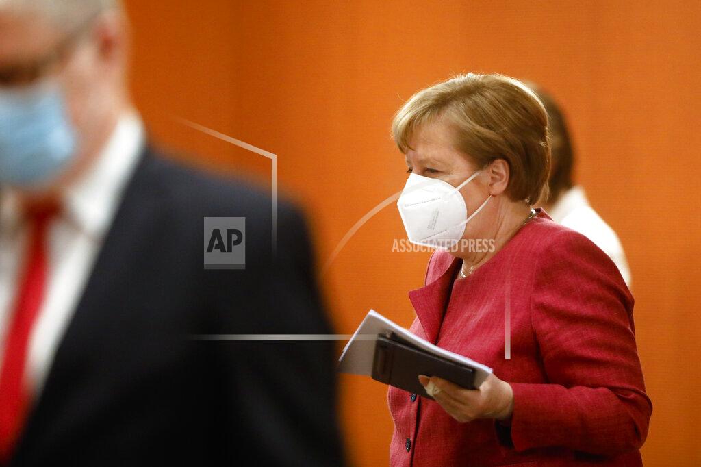 Markus Schreiber German Chancellor Angela Merkel arrives for the weekly cabinet meeting of the German government at the chancellery in Berlin, Tuesday, April 27, 2021. (AP Photo/Markus Schreiber, Pool)