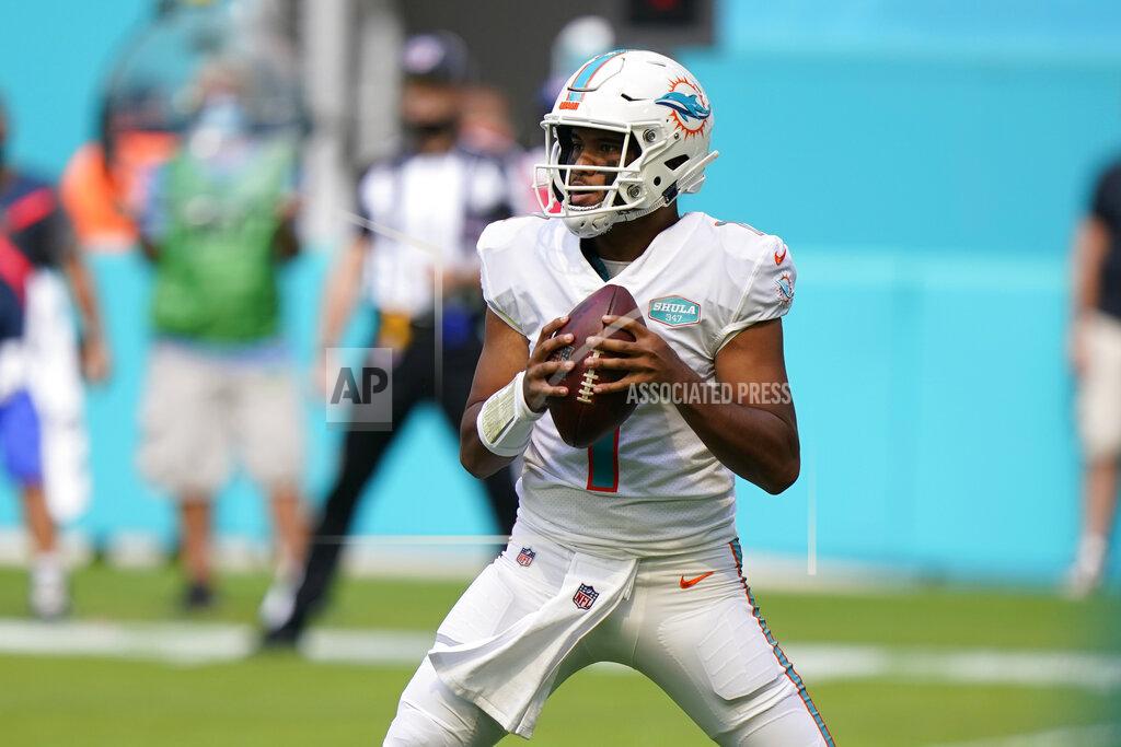Wilfredo Lee Miami Dolphins quarterback Tua Tagovailoa (1) looks to pass, during the first half of an NFL football game against the Los Angeles Rams, Sunday, Nov. 1, 2020, in Miami Gardens, Fla. (AP Photo/Wilfredo Lee)