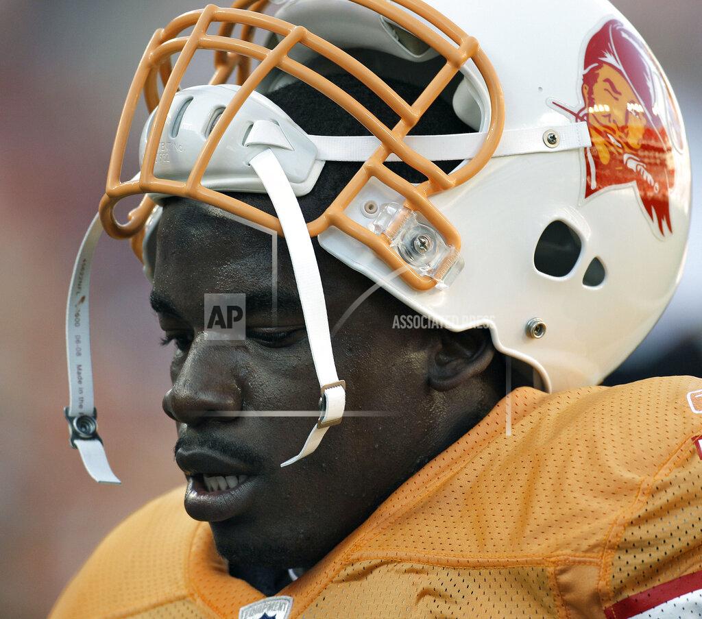 Chris O'meara FILE - Tampa Bay Buccaneers linebacker Geno Hayes is shown during an NFL football game against the Atlanta Falcons in Tampa, Fla., in this Sunday, Dec. 5, 2010, file photo. Hayes, a former NFL linebacker who starred at Florida State, has died. He was 33. The Tampa Bay Buccaneers on Tuesday, April 27, 2021, confirmed his death. He had liver disease and had been in hospice care. (AP Photo/Chris O'Meara, File)