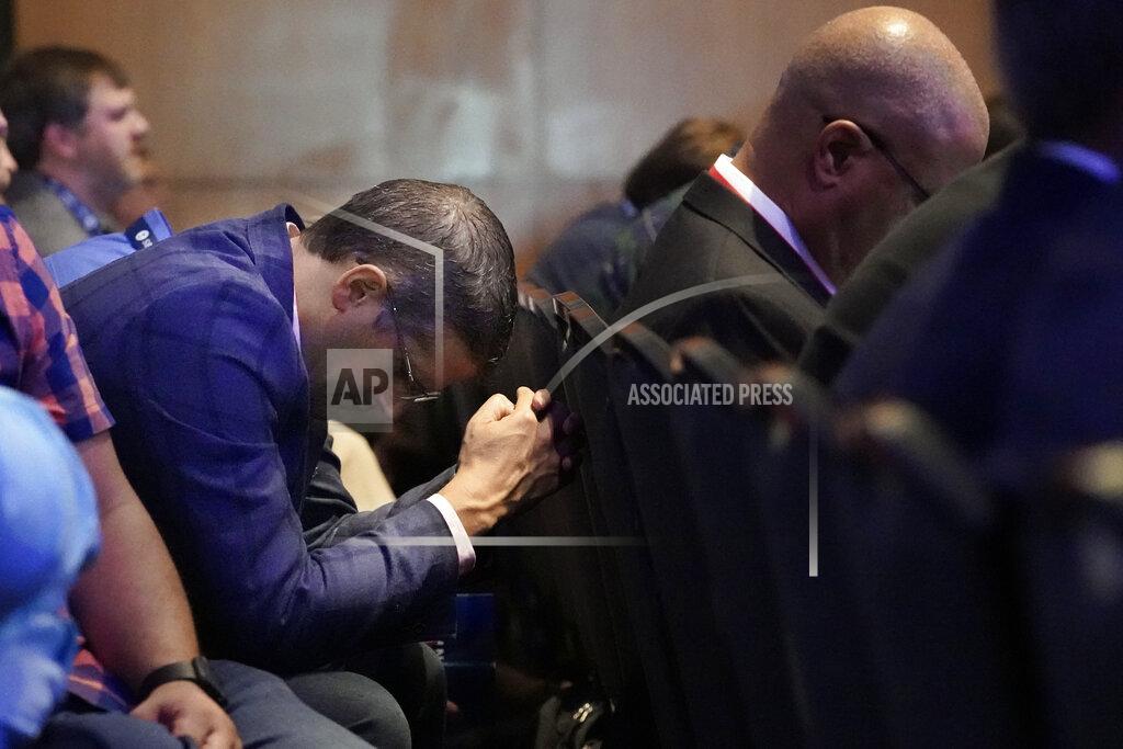 Mark Humphrey A man prays during the executive committee plenary meeting at the Southern Baptist Convention's annual meeting Monday, June 14, 2021, in Nashville, Tenn. (AP Photo/Mark Humphrey)
