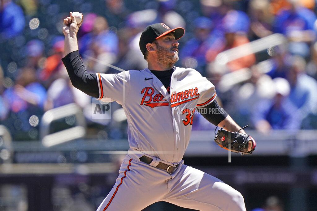 Kathy Willens Baltimore Orioles starting pitcher Matt Harvey (32) winds up during the first inning of a baseball game against the New York Mets, Wednesday, May 12, 2021, in New York. (AP Photo/Kathy Willens)