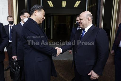Japanese leader arrives in Kyiv as China's Xi visits Ru... - Vimarsana News