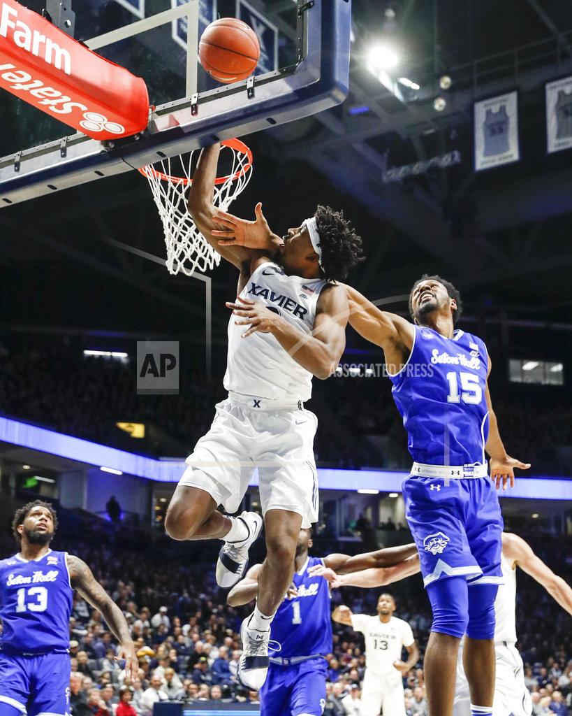 John Minchillo Xavier's Tyrique Jones (0) shoots next to Seton Hall's Taurean Thompson (15) during the first half of an NCAA college basketball game Wednesday, Jan. 2, 2019, in Cincinnati. (AP Photo/John Minchillo)