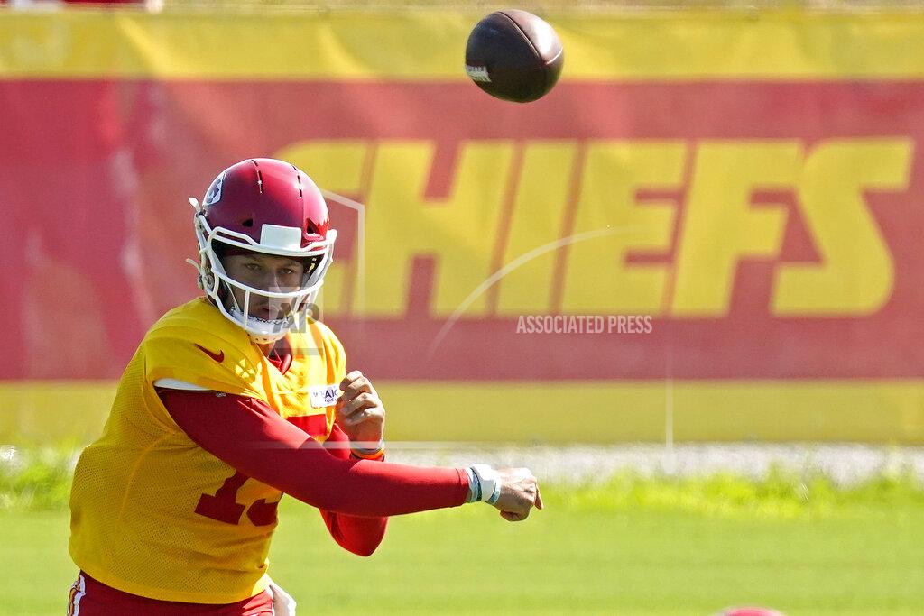 Charlie Riedel Kansas City Chiefs quarterback Patrick Mahomes passes the ball at NFL football training camp Tuesday, Aug. 17, 2021, in St. Joseph, Mo. (AP Photo/Charlie Riedel)