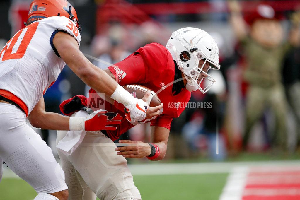 Nati Harnik Nebraska quarterback Adrian Martinez (2) runs into the end zone for a touchdown past Illinois defensive back Sydney Brown (30) during the first half of an NCAA college football game in Lincoln, Neb., Saturday, Nov. 10, 2018. (AP Photo/Nati Harnik)