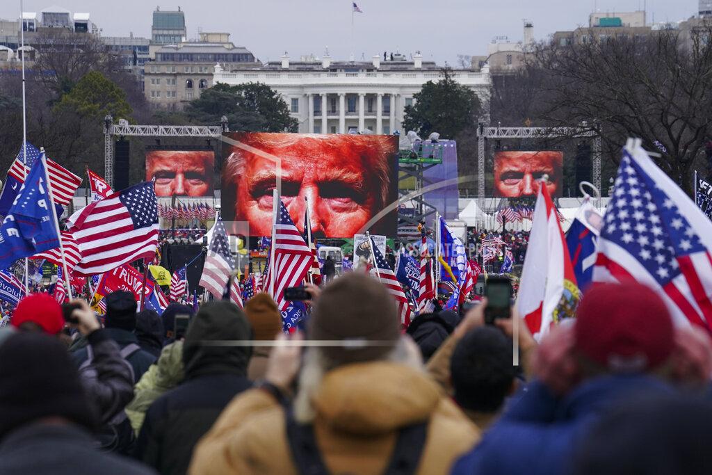 John Minchillo FILE - In this Jan. 6, 2021 file photo, Trump supporters participate in a rally in Washington. An AP review of records finds that members of President Donald Trump’s failed campaign were key players in the Washington rally that spawned a deadly assault on the U.S. Capitol last week. (AP Photo/John Minchillo)