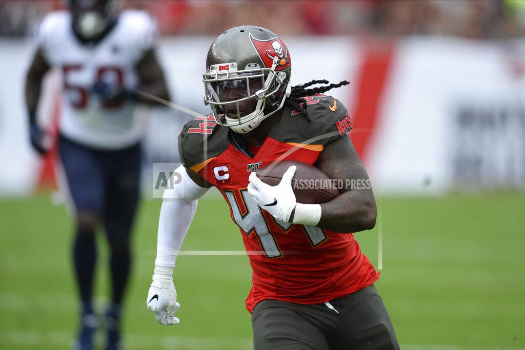 Jason Behnken FILE - Tampa Bay Buccaneers running back Dare Ogunbowale (44) runs after a catch against the Houston Texans during the first half of an NFL football game Saturday, Dec. 21, 2019, in Tampa, Fla. The Jacksonville Jaguars placed running back Devine Ozigbo on injured reserve with a left hamstring injury Thursday, Sept. 10, 2020, and signed former Tampa Bay running back Dare Ogunbowale to fill his roster spot. Ogunbowale could be in uniform for the team's opener Sunday against Indianapolis since Jacksonville has little depth at the position. (AP Photo/Jason Behnken, File)