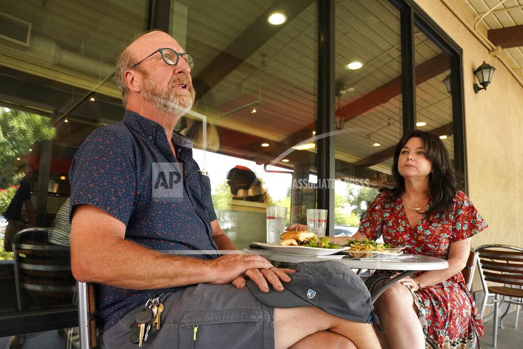Rich Pedroncelli Curtis Selland and Leslie Pugsley, both Democrats shared their views on the September recall of Gov. Gavin Newsom, over lunch in Fresno, Calif., Thursday, July, 29, 2021.Both said they would vote against the recall but aren't his biggest fans. (AP Photo/Rich Pedroncelli)