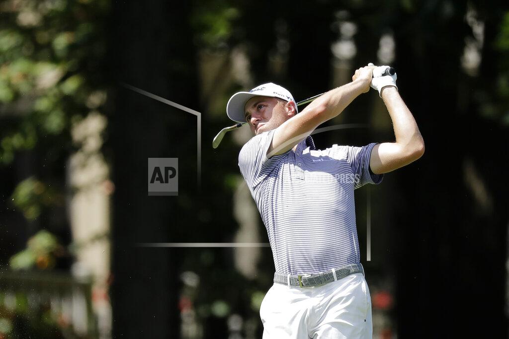 Darron Cummings Justin Thomas hits toward the ninth green during the second round of the Memorial golf tournament, Friday, July 17, 2020, in Dublin, Ohio. (AP Photo/Darron Cummings)