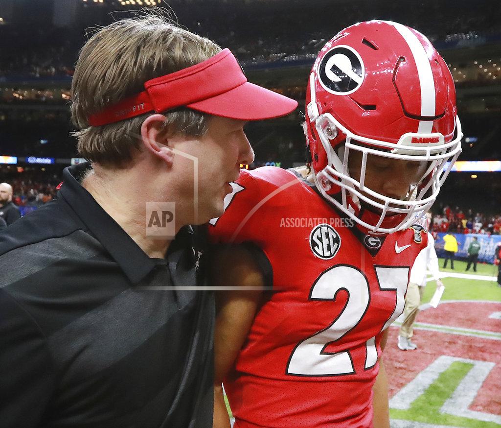 Curtis Compton Georgia coach Kirby Smart consoles defensive back Eric Stokes after the team's 28-21 loss to Texas during the Sugar Bowl NCAA college football game Tuesday, Jan. 1, 2019, in New Orleans. (Curtis Compton/Atlanta Journal Constitution via AP)