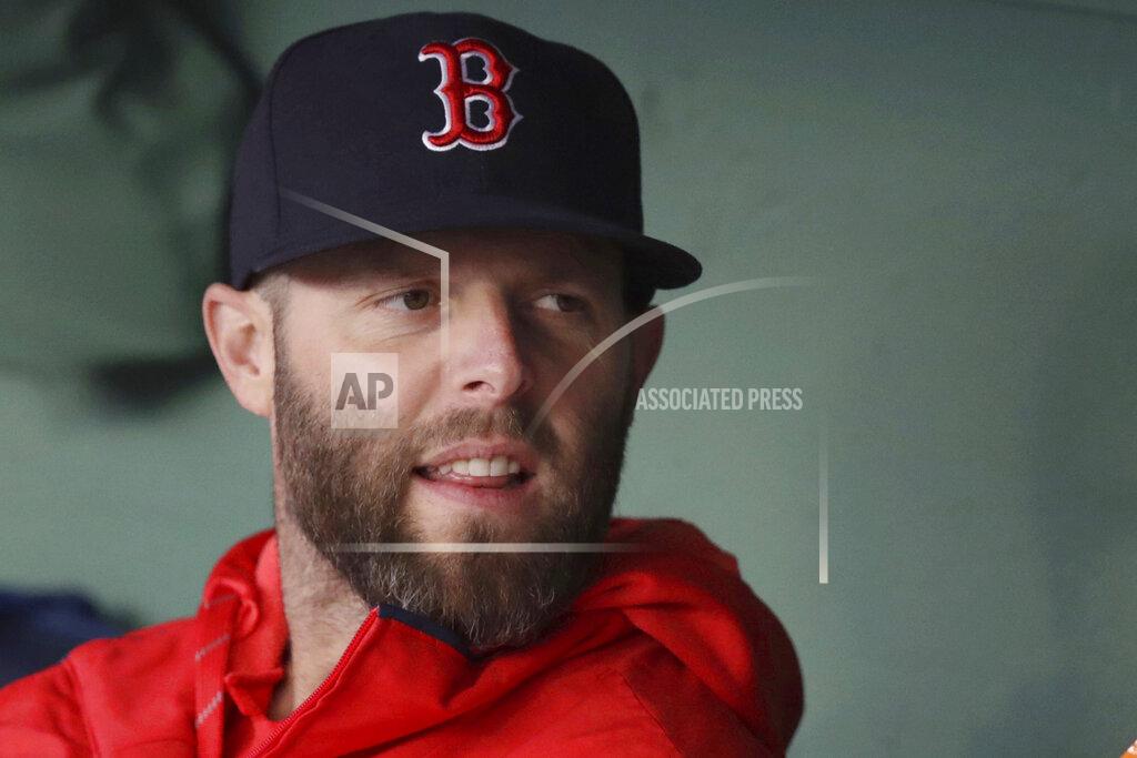 Charles Krupa FILE - In this Tuesday, April 30, 2019, file photo, Boston Red Sox's Dustin Pedroia sits in the dugout prior to a baseball game at Fenway Park, in Boston. Pedroia, who was the 2007 Rookie of the Year and the AL MVP in his second season, retired Monday, Feb. 1, 2021. (AP Photo/Charles Krupa, File)
