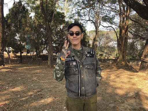 Political activist Mongkhon Thirakot flashes the pro-democracy gesture of a three-finger salute ahead of going to a court in Thailand&rsquo;s northern province of Chiang Rai, Thailand, Thursday Jan. 26, 2023. An appeals court in Thailand has handed a political activist what is believed to be a record-long sentence for the criminal offense of insulting the monarchy, giving him a 50-year prison term after finding him guilty of 25 violations of the law. Mongkhon Thirakot 30, had originally been sentenced last year to 28 years in jail by the provincial court in the northern province of Chiang Rai. (Thai Lawyers for Human Rights via AP)