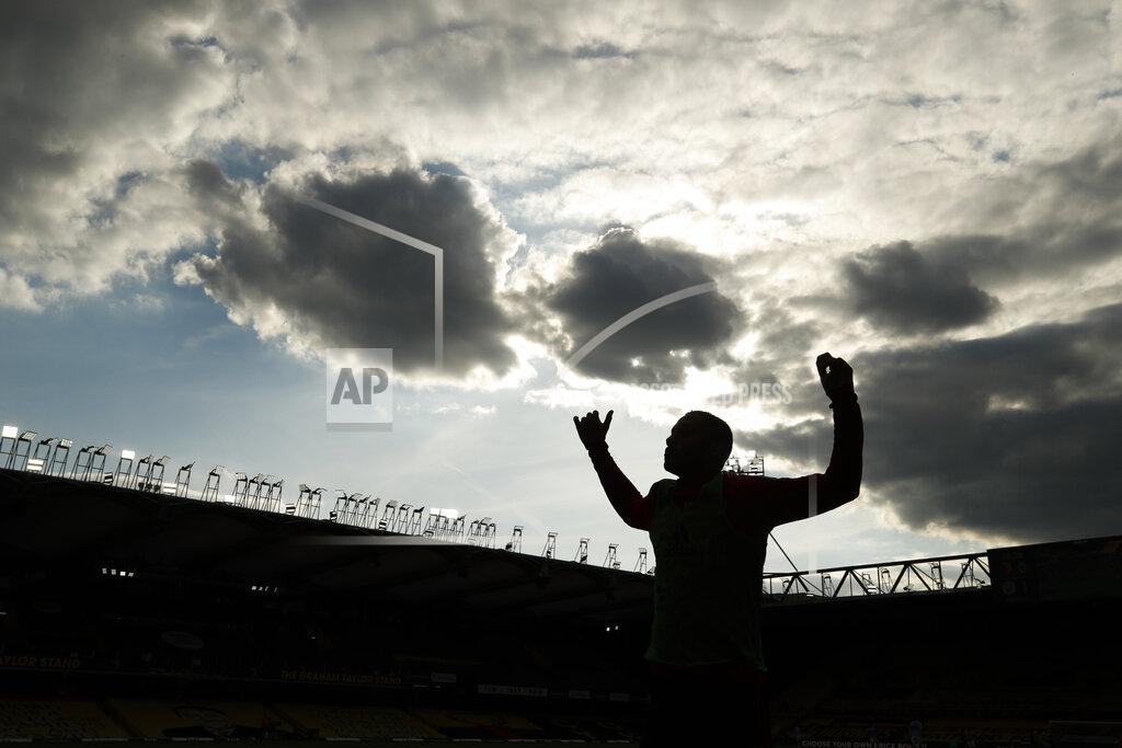 John Sibley Watford's Joao Pedro warms up during the English Premier League soccer match between Watford and Manchester City at the Vicarage Road Stadium in Watford, England, Tuesday, July 21, 2020. (John Sibley/Pool via AP)