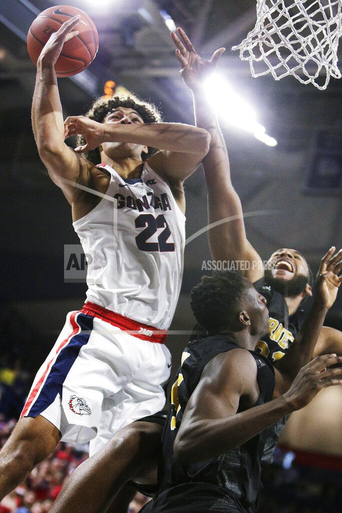 Young Kwak Gonzaga forward Anton Watson, left, and Alabama State forward Mike Stone, right, go after a rebound during the second half of an NCAA college basketball game in Spokane, Wash., Tuesday, Nov. 5, 2019. Gonzaga won 95-64. (AP Photo/Young Kwak)