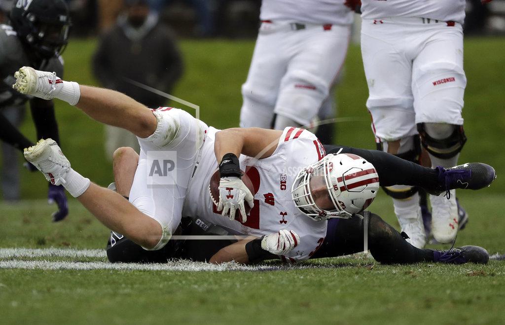 Nam Y. Huh Wisconsin running back Garrett Groshek (37) is tackled by Northwestern linebacker Paddy Fisher during the second half of an NCAA college football game in Evanston, Ill., Saturday, Oct. 27, 2018. (AP Photo/Nam Y. Huh)