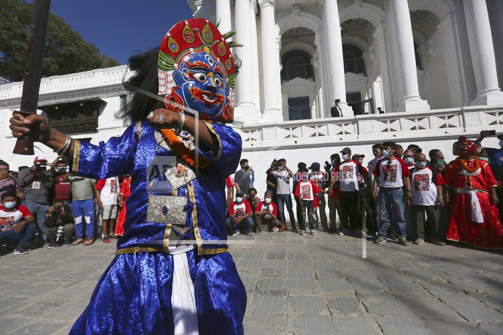 Niranjan Shrestha Masked dancers perform during the annual Indra Jatra festival in Kathmandu, Nepal, Sunday, Sept. 19, 2021. The feast of Indra Jatra marks the return of the festival season in the Himalayan nation two years after it was scaled down because the pandemic. (AP Photo/Niranjan Shrestha)