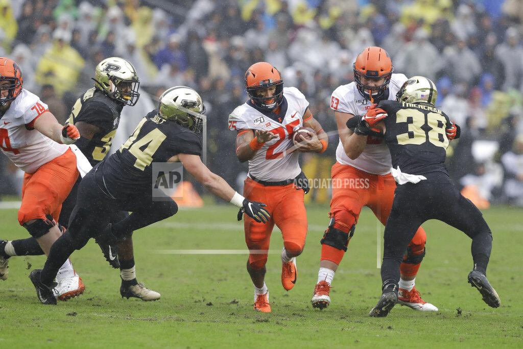 Darron Cummings Illinois running back Dre Brown (25) is tackled by Purdue linebacker Ben Holt (44) during the first half of an NCAA college football game, Saturday, Oct. 26, 2019, in West Lafayette, Ind. (AP Photo/Darron Cummings)
