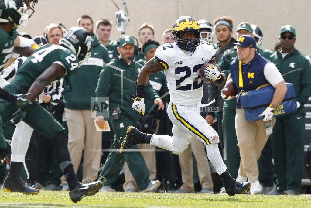 Carlos Osorio Michigan running back Karan Higdon breaks downfield during the first half of an NCAA college football game against Michigan State , Saturday, Oct. 20, 2018, in East Lansing, Mich. (AP Photo/Carlos Osorio)