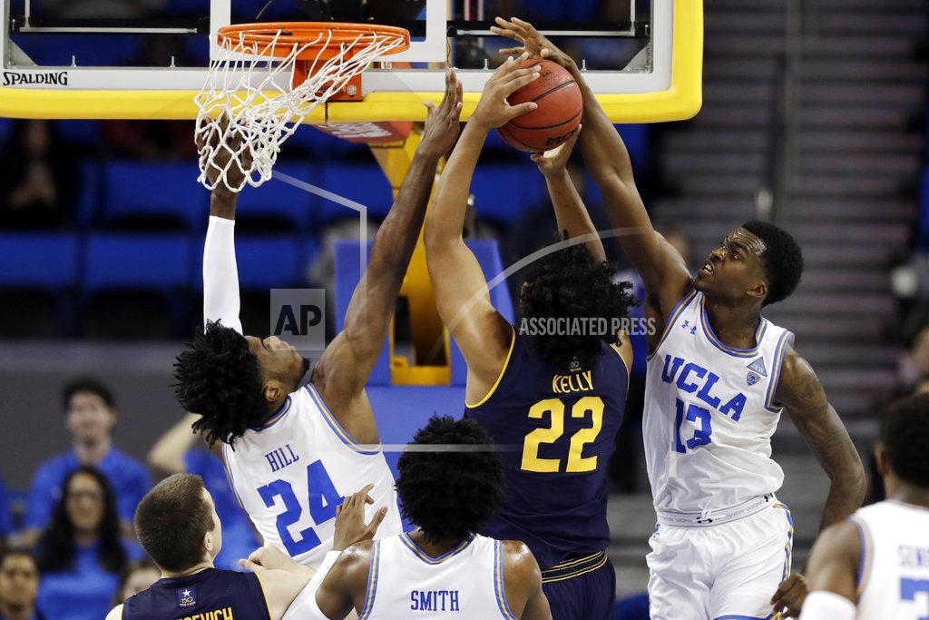 Marcio Jose Sanchez UCLA guard Kris Wilkes, right, blocks a shot from California forward Andre Kelly (22) during the second half of an NCAA college basketball game Saturday, Jan. 5, 2019, in Los Angeles. (AP Photo/Marcio Jose Sanchez)