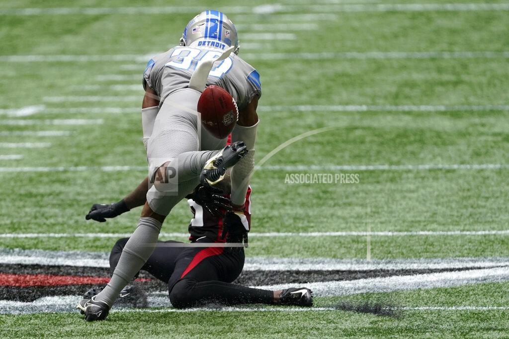 John Bazemore Atlanta Falcons wide receiver Calvin Ridley (18) and Detroit Lions cornerback Jeff Okudah (30) vie for a passed ball during the first half of an NFL football game, Sunday, Oct. 25, 2020, in Atlanta. (AP Photo/John Bazemore)
