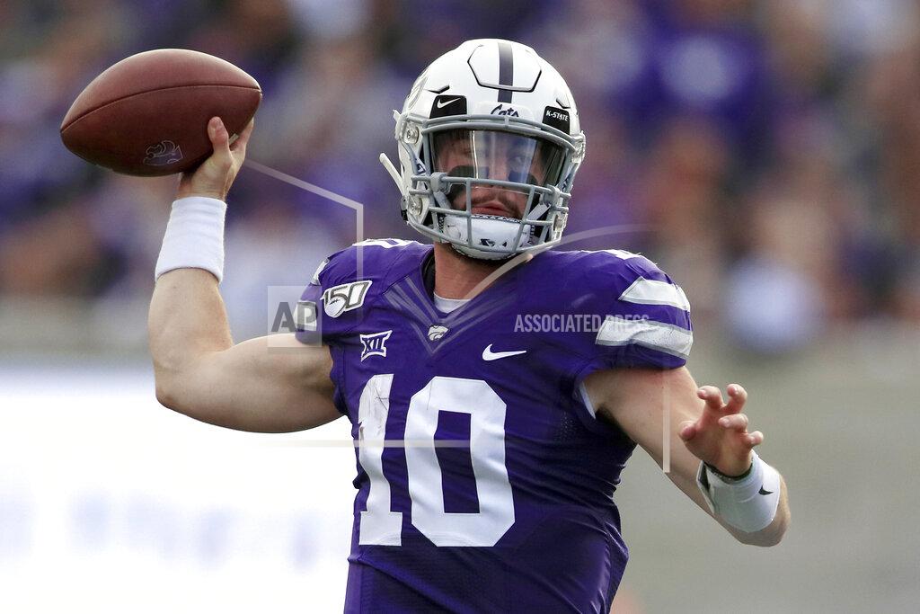 Orlin Wagner Kansas State quarterback Skylar Thompson (10) passes to a teammate during the first half of an NCAA college football game against West Virginia in Manhattan, Kan., Saturday, Nov. 16, 2019. (AP Photo/Orlin Wagner)