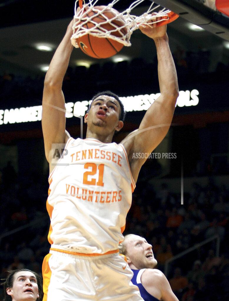 Tom Sherlin Tennessee's Oliver Nkamhoua (21) dunks the ball against UNC Asheville during an NCAA college basketball game Tuesday, Nov. 5, 2019, in Knoxville, Tenn. (Tom Sherlin/The Daily Times via AP)