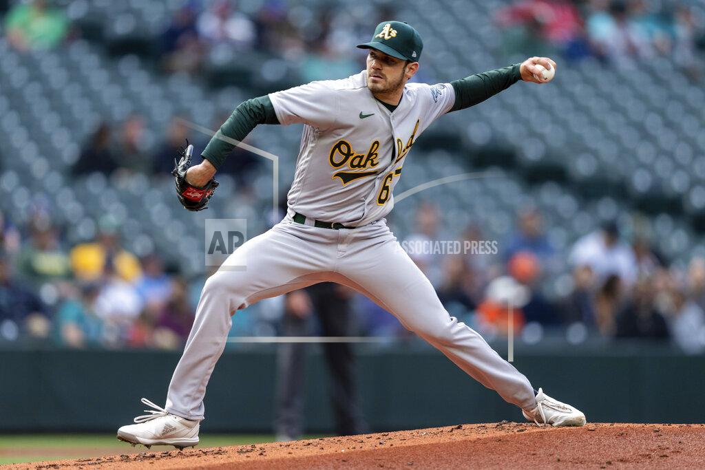Stephen Brashear Oakland Athletics starter Zach Logue delivers a pitch during the first inning of a baseball game against the Seattle Mariners, Monday, May 23, 2022, in Seattle. (AP Photo/Stephen Brashear)