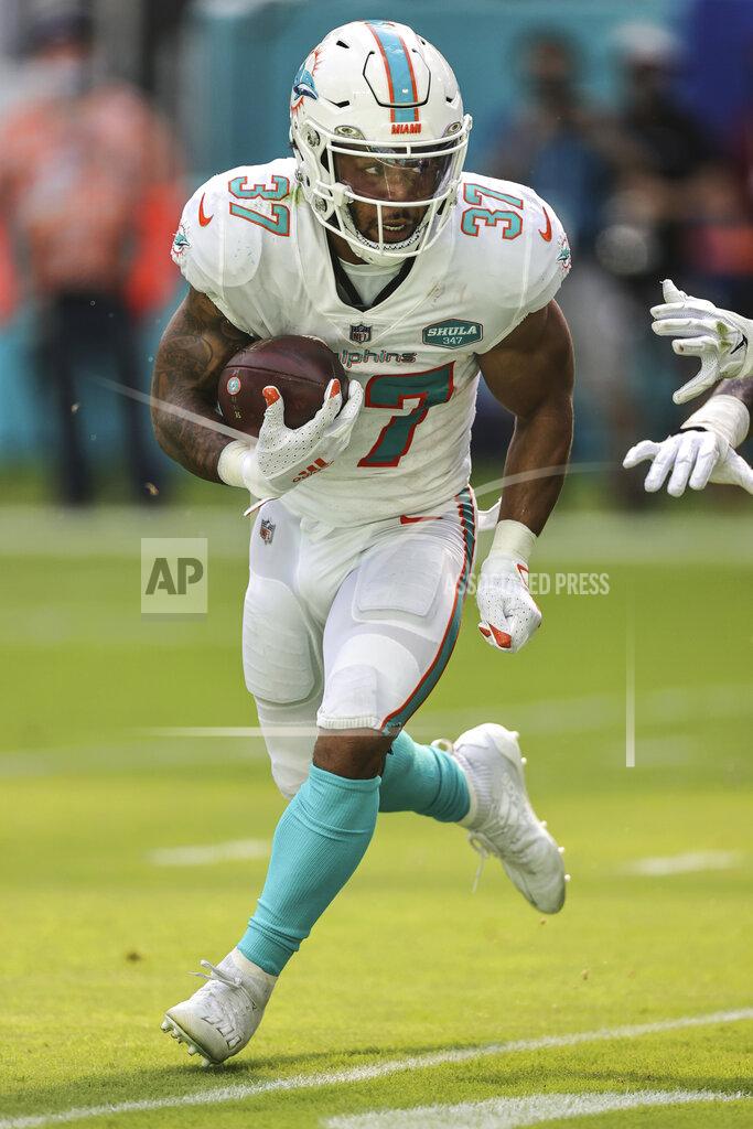 Margaret Bowles Miami Dolphins running back Myles Gaskin (37) carries the ball during an NFL game against the Los Angeles Rams, Sunday, Nov. 1, 2020 in Miami Gardens, Fla. The Dolphins defeated the Rams 28-17. (Margaret Bowles via AP)