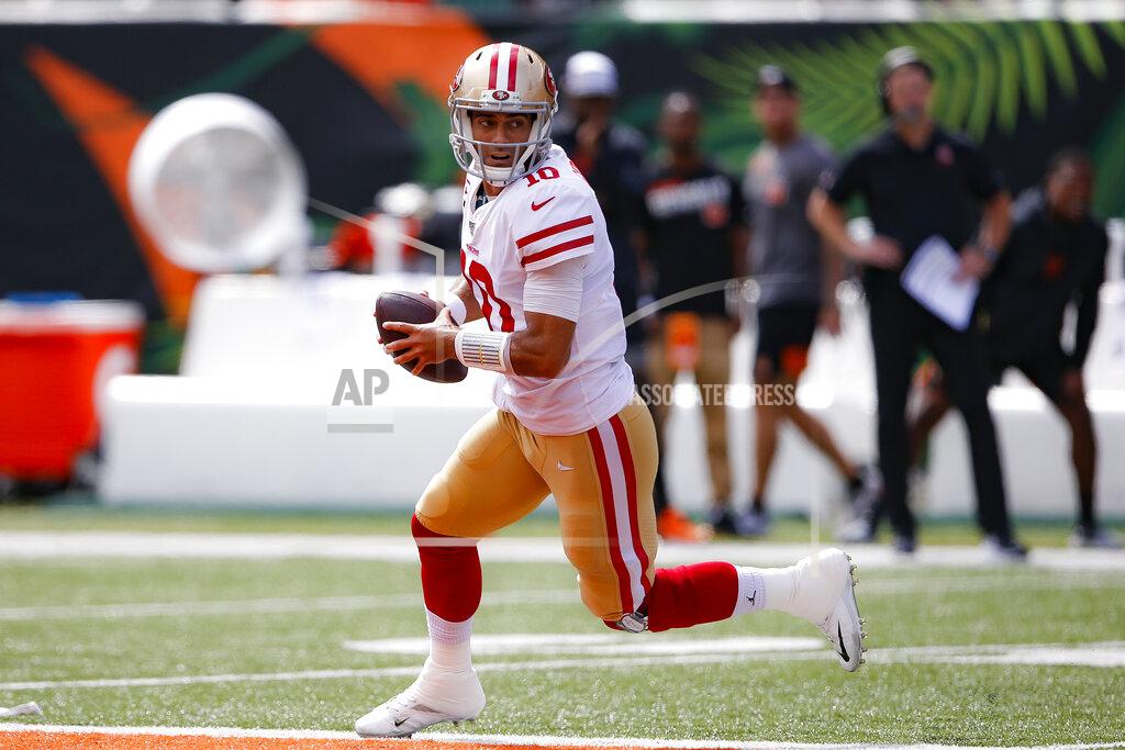 Gary Landers San Francisco 49ers wide receiver Marquise Goodwin (11) looks to pass on the run during the first half an NFL football game against the Cincinnati Bengals, Sunday, Sept. 15, 2019, in Cincinnati. (AP Photo/Gary Landers)
