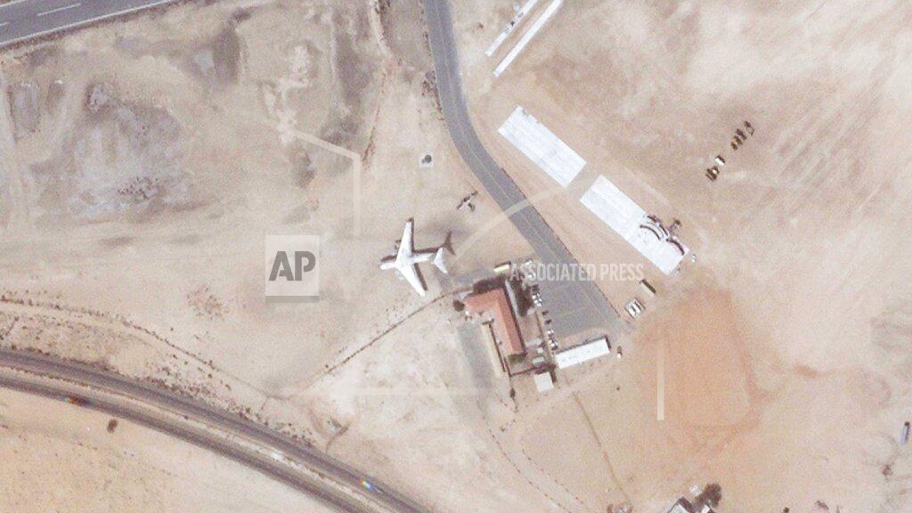 Planet Labs Pbc This satellite image from Planet Labs PBC shows an Ilyushin Il-76 cargo jet once flown on behalf of arms smuggler Viktor Bout in Umm al-Quwain, United Arab Emirates, March 23, 2022. The Soviet-era cargo plane linked to the arms smuggler known as the "Merchant of Death" is being dismantled in a sheikhdom in the United Arab Emirates, even as Russia suggests trading him for American prisoners Moscow holds amid the war in Ukraine. (Planet Labs PBC via AP)