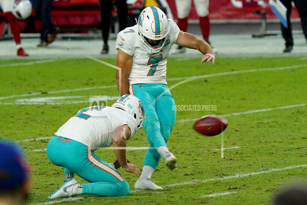 Rick Scuteri Miami Dolphins kicker Jason Sanders (7) kicks a field goal as punter Matt Haack (2) holds during the second half of an NFL football game against the Arizona Cardinals, Sunday, Nov. 8, 2020, in Glendale, Ariz. (AP Photo/Rick Scuteri)