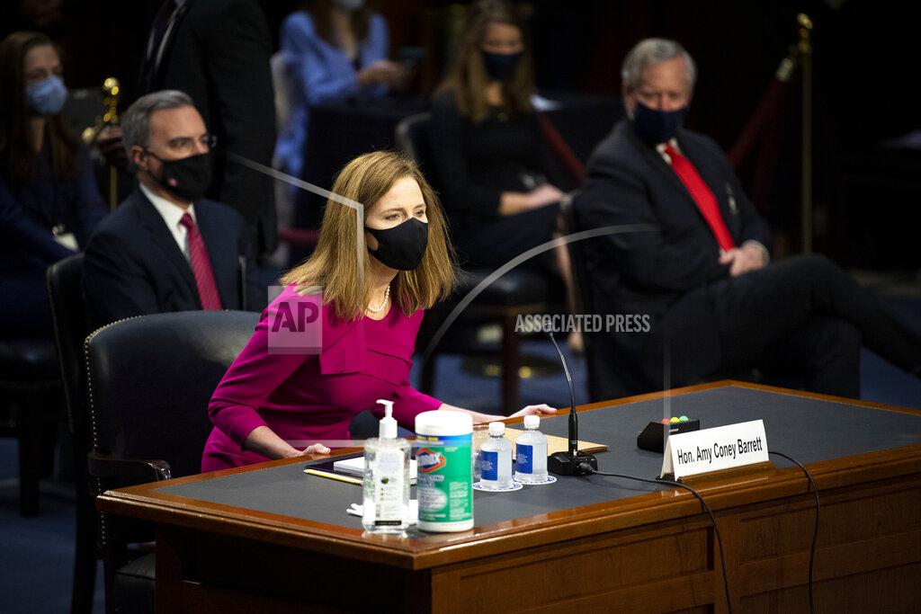Caroline Brehman Supreme Court nominee Amy Coney Barrett arrives for her Senate Judiciary Committee confirmation hearing on Capitol Hill in Washington, Monday, Oct. 12, 2020. (Caroline Brehman/Pool via AP)