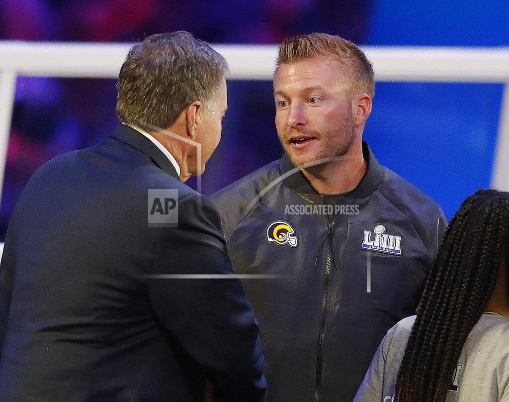 John Bazemore New England Patriots head coach Bill Belichick, left, talks to Los Angeles Rams head coach Sean McVay during Opening Night for the NFL Super Bowl 53 football game Monday, Jan. 28, 2019, in Atlanta. (AP Photo/John Bazemore)