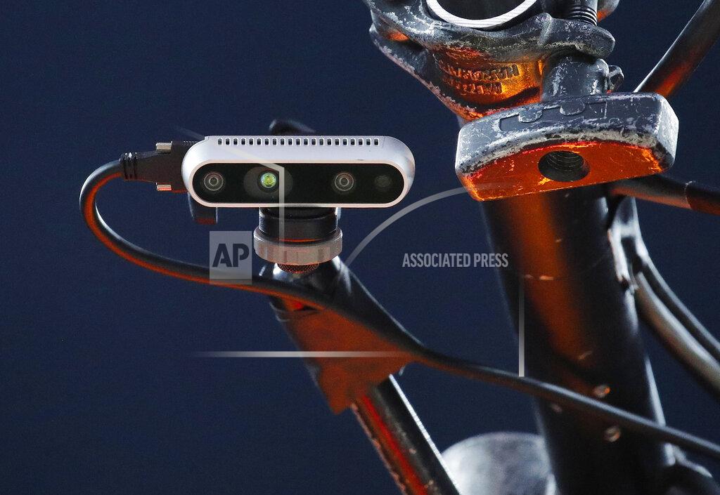 John Locher In this Friday, March 15, 2019, photo, a Noah Basketball sensor is mounted above a basket at the Pac-12 men's tournament in Las Vegas. John Carter, CEO of Noah Basketball, says there are 45 NBA and college customers that have the new version of the system. The Noah system, so named because of the company’s focus on the arc of shots, can actually measure a lot more than that. Teams can access seemingly endless amounts of data, tracking not only the arc, but where a shot was taken from and where it ended up in relation to the basket. The system can measure if a shot is too far to the left or right _ or if it’s too short or long. (AP Photo/John Locher)