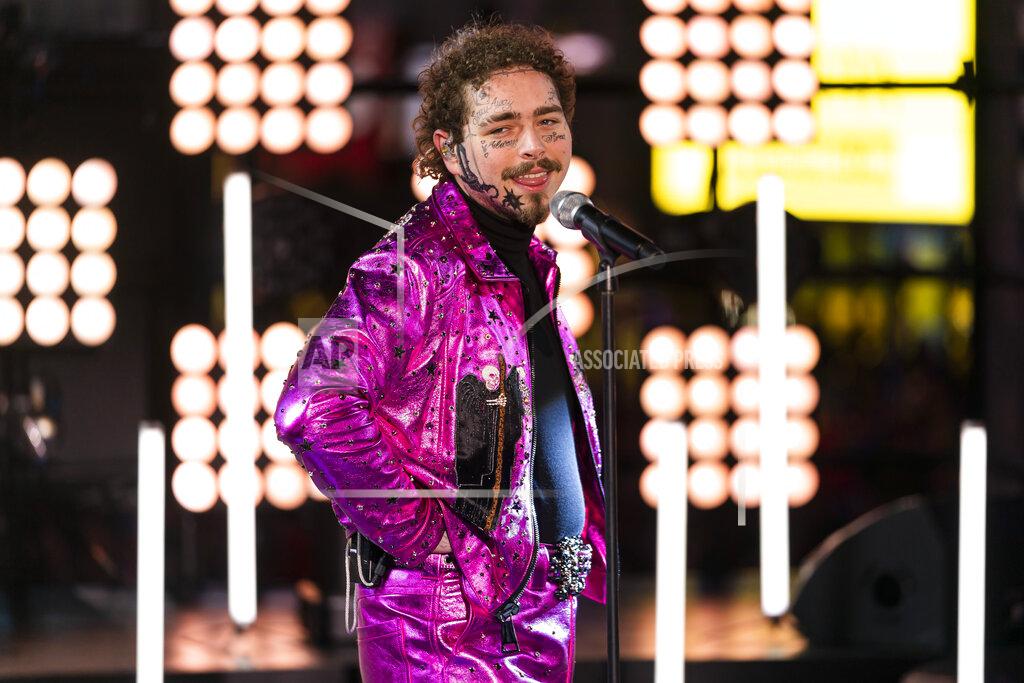 Ben Hider Post Malone performs at the Times Square New Year's Eve celebration, Tuesday, Dec. 31, 2019, in New York. (Photo by Ben Hider/Invision/AP)