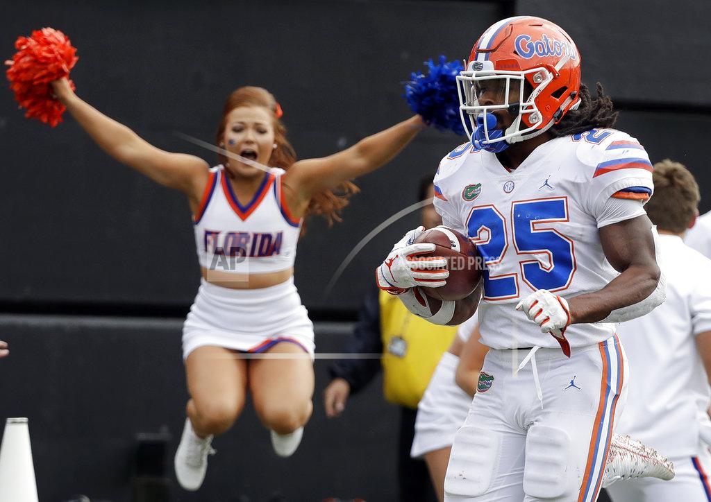Mark Humphrey Florida running back Jordan Scarlett (25) runs 48-yards for a touchdown against Vanderbilt in the second half of an NCAA college football game Saturday, Oct. 13, 2018, in Nashville, Tenn. (AP Photo/Mark Humphrey)