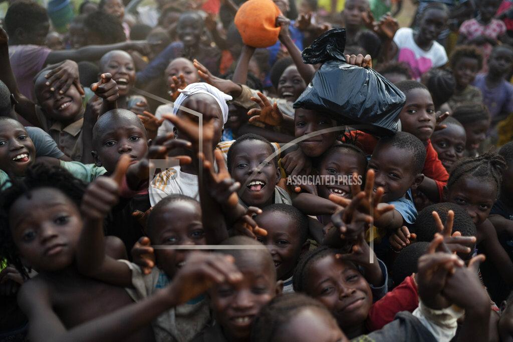 Leo Correa Chidren pose for a photo in Komao village, on the outskirts of Koidu, district of Kono, Sierra Leone, Sunday, Nov. 22, 2020. (AP Photo/Leo Correa)