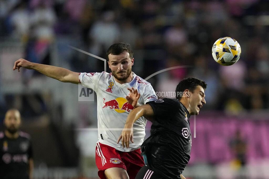 Rebecca Blackwell New York Red Bulls defender Thomas Edwards, left, clashes with Inter Miami forward Robbie Robinson during the first half of an MLS soccer match Friday, Sept. 17, 2021, in Fort Lauderdale, Fla. (AP Photo/Rebecca Blackwell)