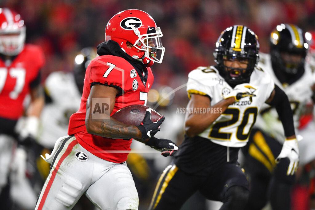 John Amis FILE - In this Nov. 9, 2019, file photo, Georgia running back D'Andre Swift runs as Missouri defensive back Khalil Oliver (20) defends during an NCAA college football game in Athens, Ga. Swift is one of the top running backs in the upcoming NFL draft. (AP Photo/John Amis, File)