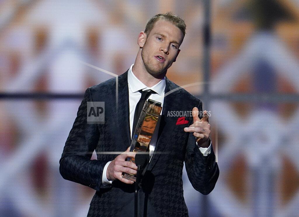 David J. Phillip AP Comeback Player of the Year, Tennessee Titans' Ryan Tannehill speaks at the NFL Honors football award show Saturday, Feb. 1, 2020, in Miami. (AP Photo/David J. Phillip)