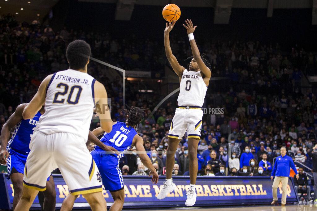 Robert Franklin Notre Dame's Blake Wesley (0) shoots the game-winning shot during Notre Dame's win over Kentucky in an NCAA college basketball game Saturday, Dec. 11, 2021, in South Bend, Ind. (AP Photo/Robert Franklin)