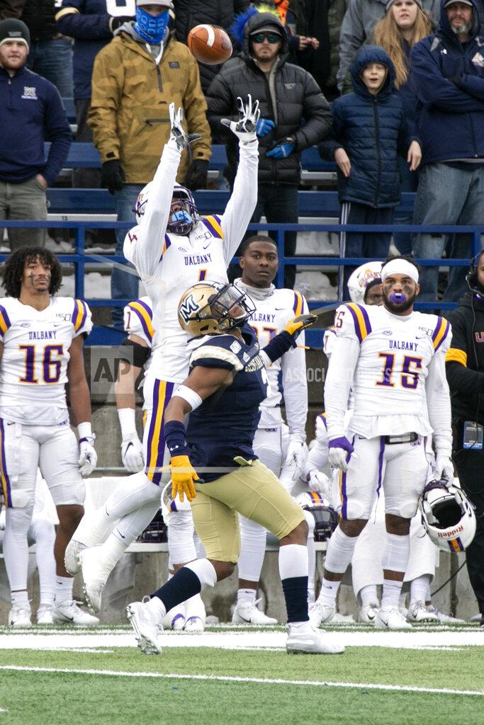 Ryan Berry Albany receiver Juwan Green catches the ball over Montana State's Tyrel Thomas, and scores a touchdown during a second-round game in the NCAA Football Championship Subdivision playoffs Saturday, Dec. 7, 2019, in Bozeman, Mont. (Ryan Berry/Bozeman Daily Chronicle via AP)
