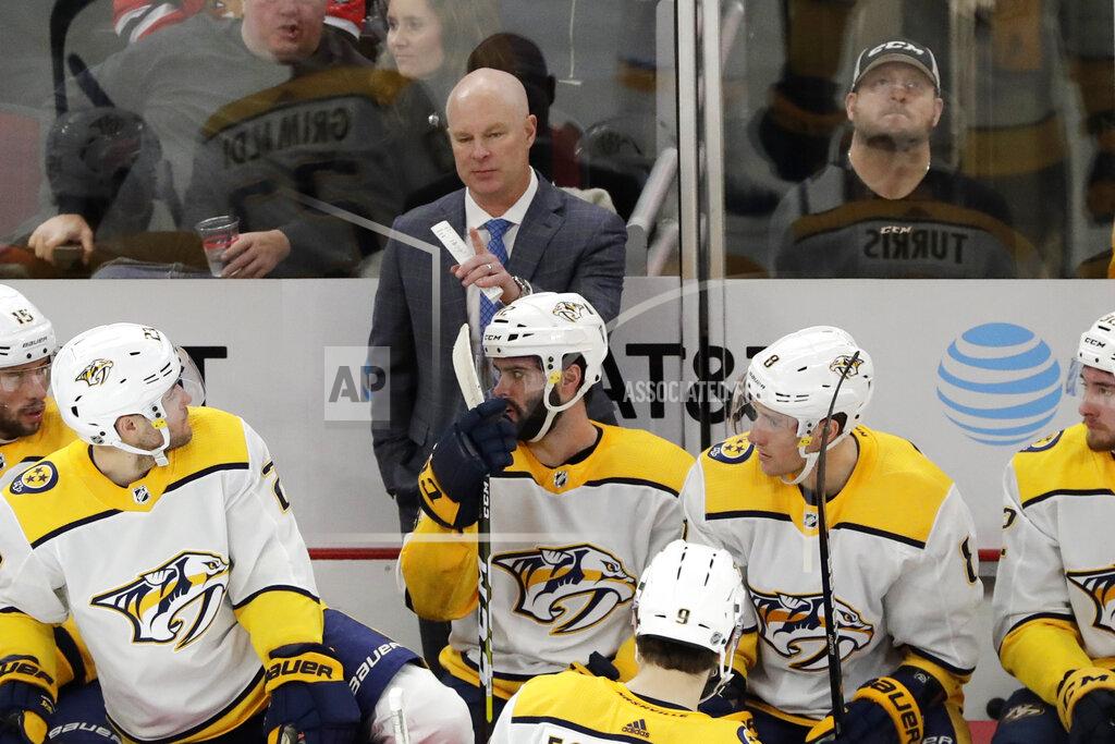 Nam Y. Huh FILE - In this Jan. 9, 2020, file photo, Nashville Predators head coach John Hynes, center top, talks to his team during the first period of an NHL hockey game against the Chicago Blackhawks in Chicago. Hynes has only been head coach of the Predators since Jan. 7, so he is trying to make up for some lost time with the NHL paused for the coronavirus pandemic and also make sure they are ready whenever hockey resumes. (AP Photo/Nam Y. Huh, File)