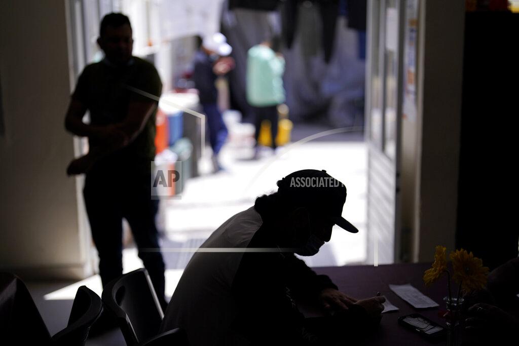 Gregory Bull FILE - A man from Nicaragua sits at a shelter for migrants, April 21, 2022, in Tijuana, Mexico. The Supreme Court has ruled that the Biden administration properly ended a Trump-era policy forcing some U.S. asylum-seekers to wait in Mexico. The justices’ 5-4 decision for the administration came in a case about the “Remain in Mexico” policy under President Donald Trump. (AP Photo/Gregory Bull, File)