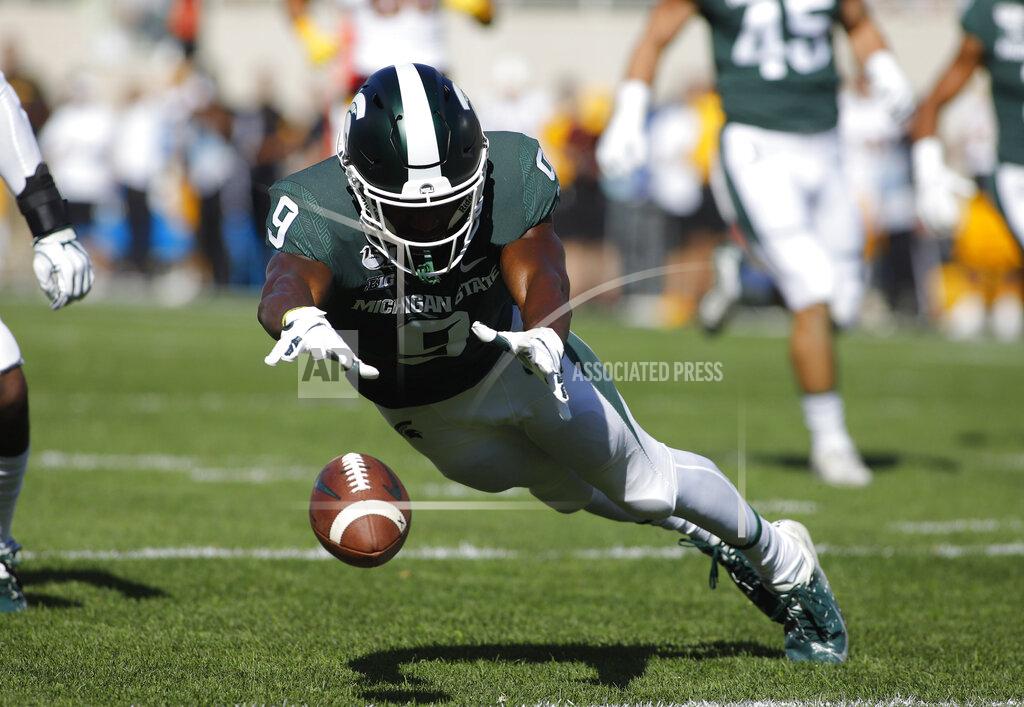 Al Goldis Michigan State's Dominique Long dives for the ball while attempting to down a punt during the first quarter of an NCAA college football game against Arizona State, Saturday, Sept. 14, 2019, in East Lansing, Mich. The ball rolled into the end zone for a touchback. (AP Photo/Al Goldis)